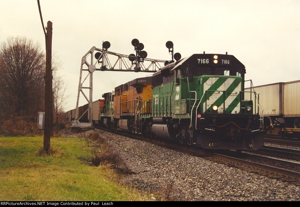 Loaded coal train rolls east